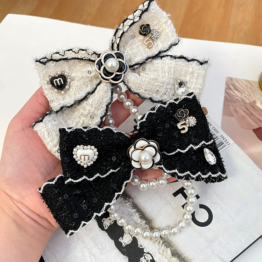 2026 Women's Cloth Bowknot Key - Vintage Fashion Ornaments avaliação e preço